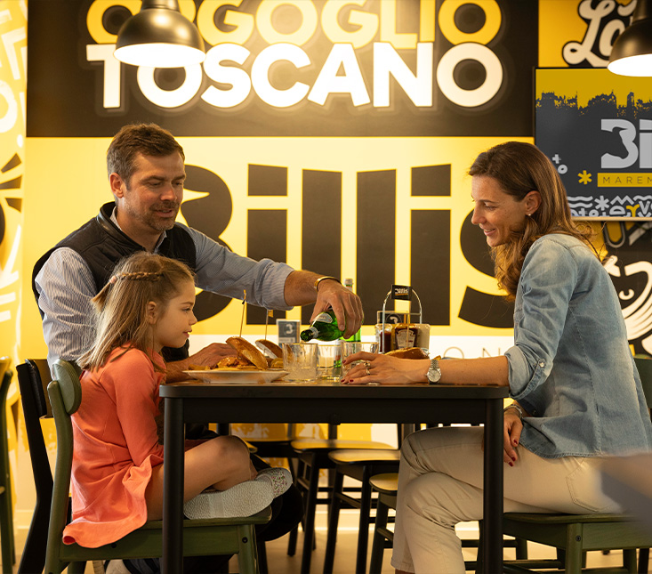 Famiglia che mangia da Billis
